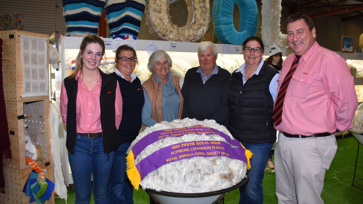 The supreme fleece at this years Perth Royal Show was exhibited by the Rintoul familys Auburn Valley stud, Williams. With the fleece which was also sashed the grand champion ram fleece, champion open ram fleece and champion fine fleece were Elders Merredin wool representative Alex Prowse (left), Auburn Valleys Jodie, Ann, Peter and Brooke Rintoul and Elders stud stock manager Tim Spicer. Elders was the sponsor of the supreme fleece award.