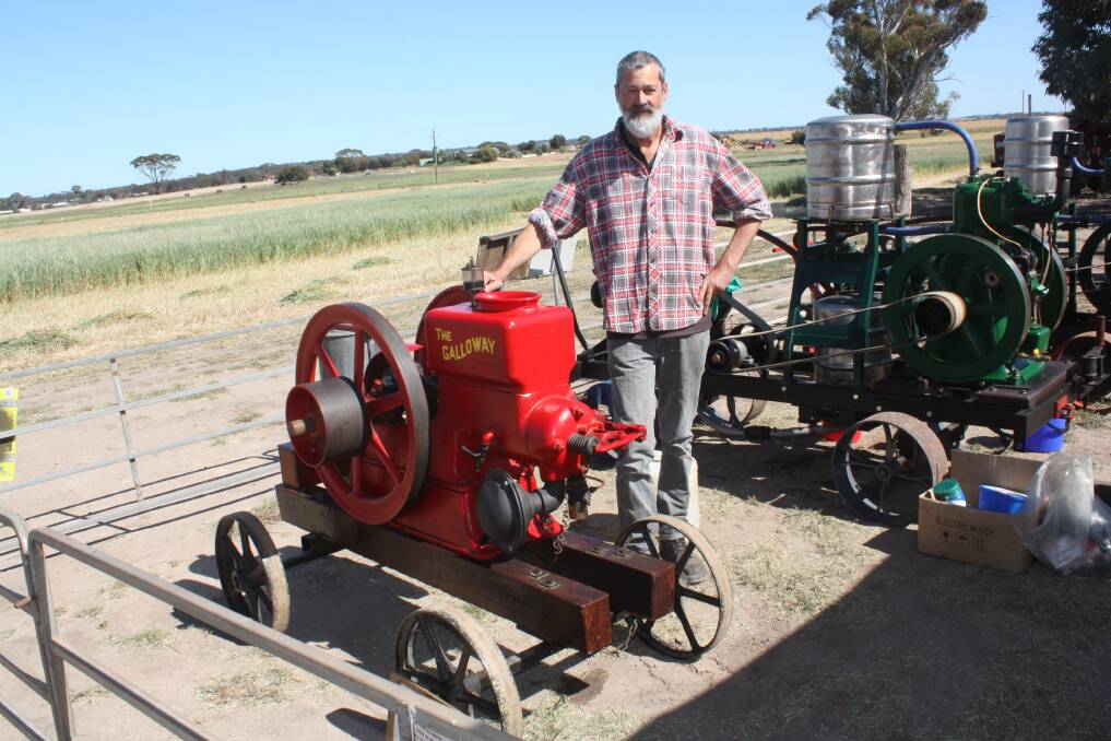 Chester Smith, Katanning with 'The Galloway Engine' (circa 1920s). Chester found it on a farm at Tincurrin and restored it to working order. Made in the United States, it was used for chaff cutting and driving a shearing plant.