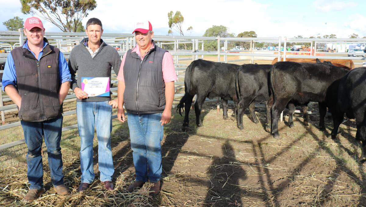 Cattle section steward Brad Kupsch (left), Allanooka, exhibitor Andrew Gillam, Gabyon Pastoral Co, Irwin and Elders Mingenew livestock agent Ross Tyndale-Powell with the Gillam's Angus-Santa Gertrudis-Angus heifers which placed second.