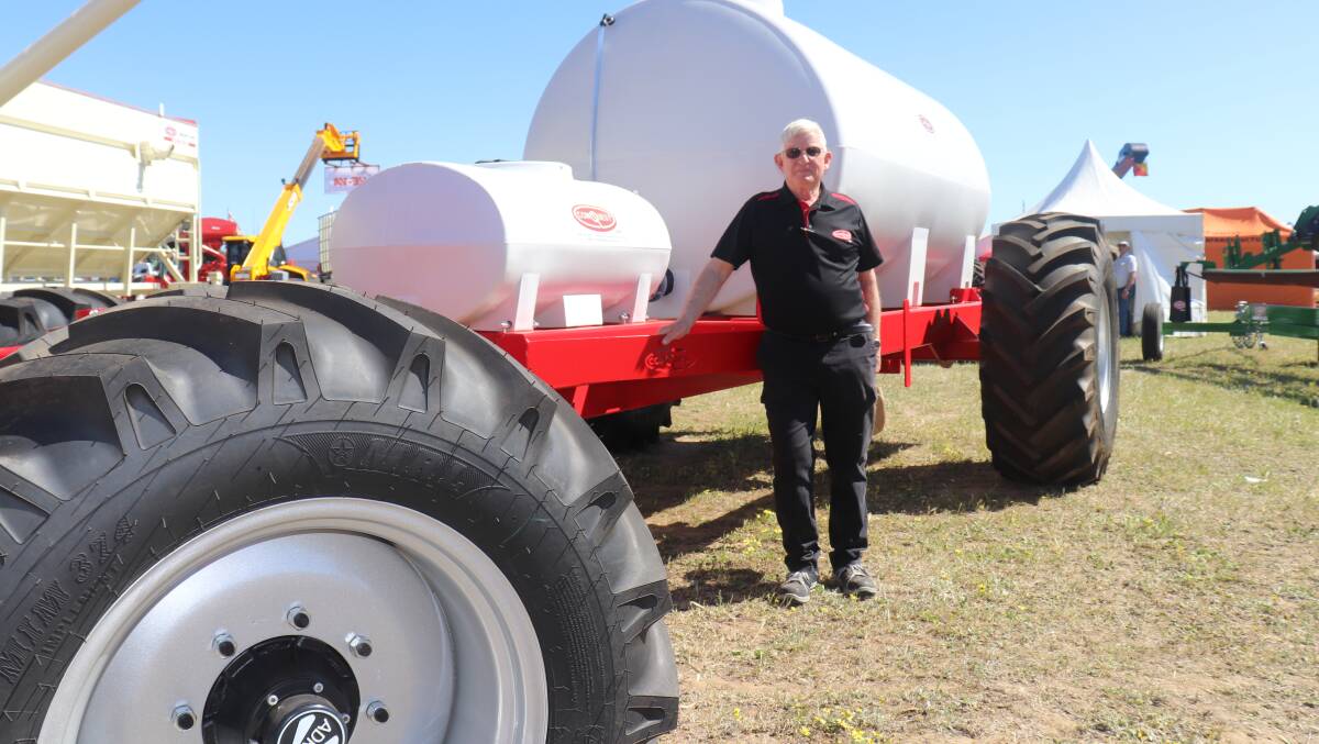 Conquest Group managing director Tim Wallace with a new liquid fertiliser cart, one of two new products the group displayed at the Dowerin Machinery Field Days.