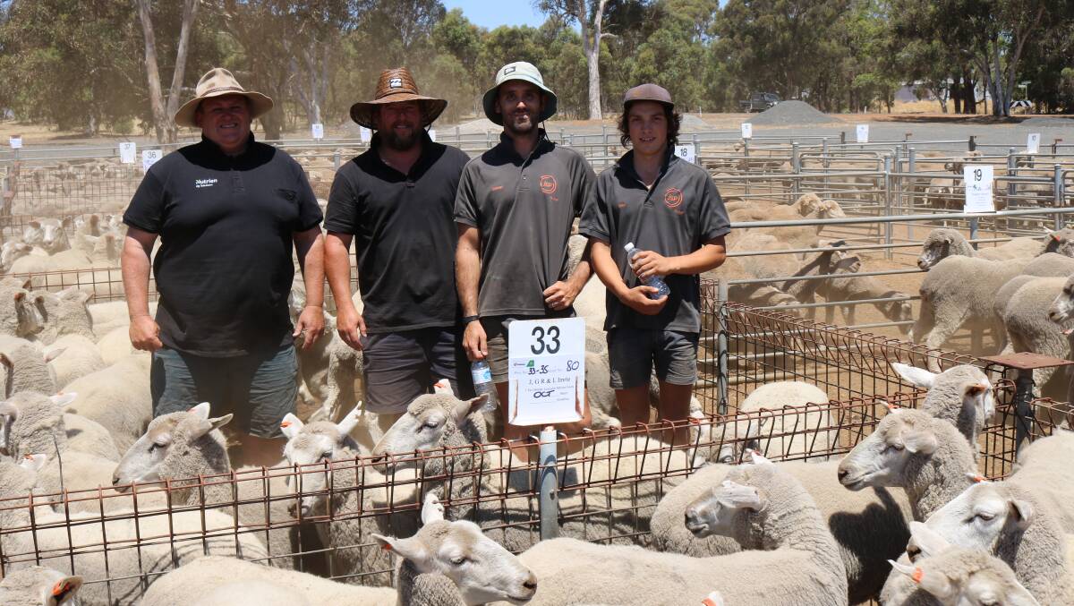 Geoff Daw (left), Primaries Kojonup, with sale top-price buyers Kane Luzny, Daniel Sarinis and Ben Thomas, Manjimup, standing in the $186 top-priced pen of 80 October shorn, Border Leicester cross 1.5yo ewes.