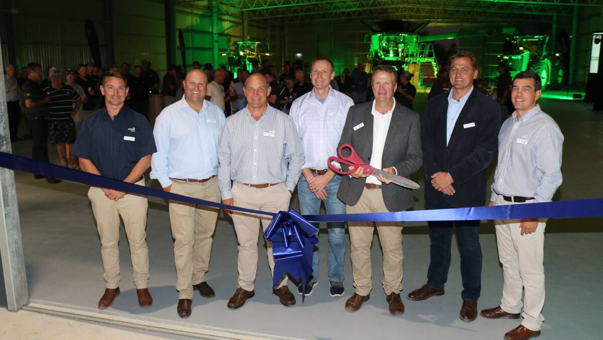 Getting ready to cut the ribbon to declare the AFGRI Equipment Esperance, workshop officially open were AFGRI Equipment Esperance, branch manager Michael Perry (left), John Deere Limited managing director Luke Chandler, Brisbane, AFGRI Equipment Australia CEO Wessel Oosthuizen, Perth, John Deere senior vice president and chief technology officer Jahmy Hindman, Moline, Illinois, United States, AFGRI Equipment managing director Patrick Roux, Centurion, South Africa, AFGRI Group CEO Norman Celliers, Centurion, South Africa and AFGRI general manager sales and marketing Jacques Coetzee, Perth.