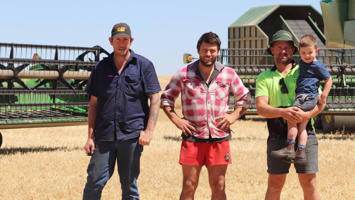 Harvest wrapped up last week on Arizona Farms at Lake Grace. Worker Caine Davidson (left), is with Luke Bairstow and Bevan McDougall with his son Hugo, 3.