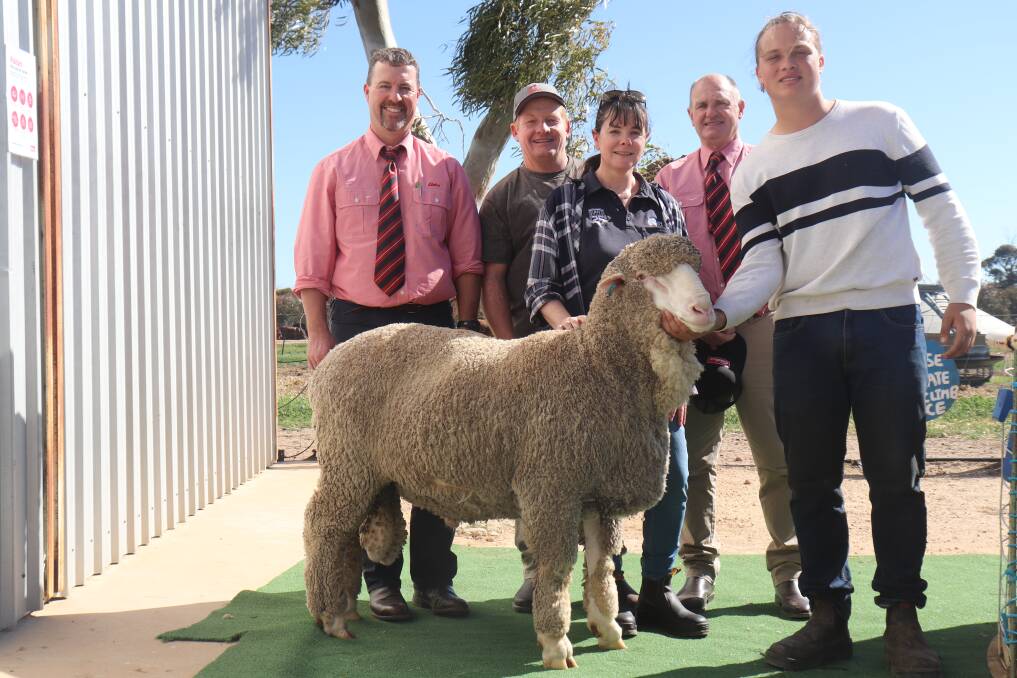  The $2600 top-priced ram at Monday's Belka Valley Poll Merino on-property ram sale at Bruce Rock was purchased by the Spark family, Bonnie Rock. With the ram were Elders auctioneer and Belka Valley classer Nathan King (left), buyers Nick and Pam Spark, Elders Merredin branch manager Andrew Peters and Belka Valley's Mitchell Jones.
