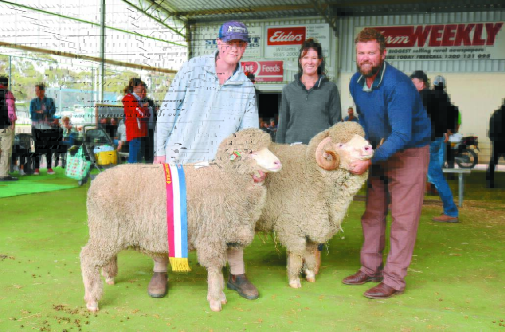  With the Graham Holton Memorial champion ram and ewe pair exhibited by the Angenup stud, Kojonup, were Angenup stud's Clancy, Tennille and Paul Norrish.