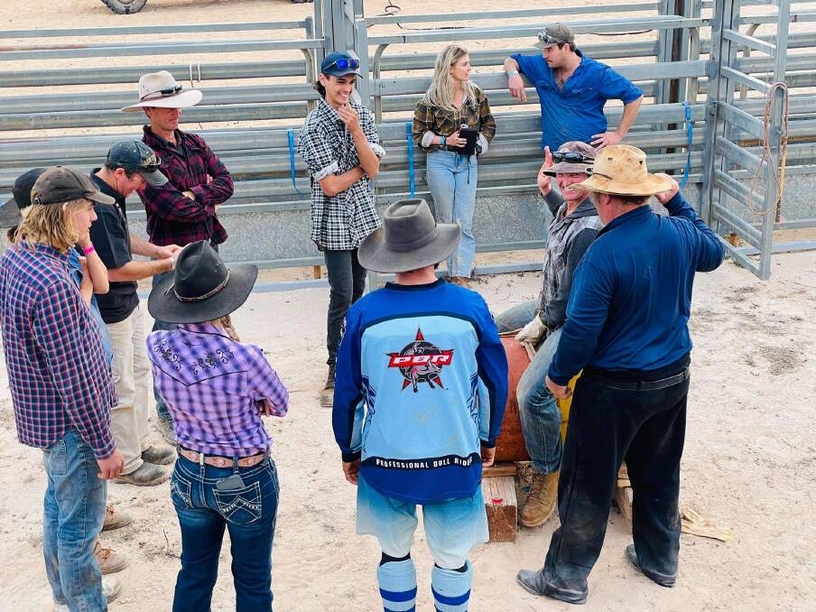 Participants in the local bull ride school listen intently to Brett Day of Gunnadorah station. Photo by Michele Campbell.