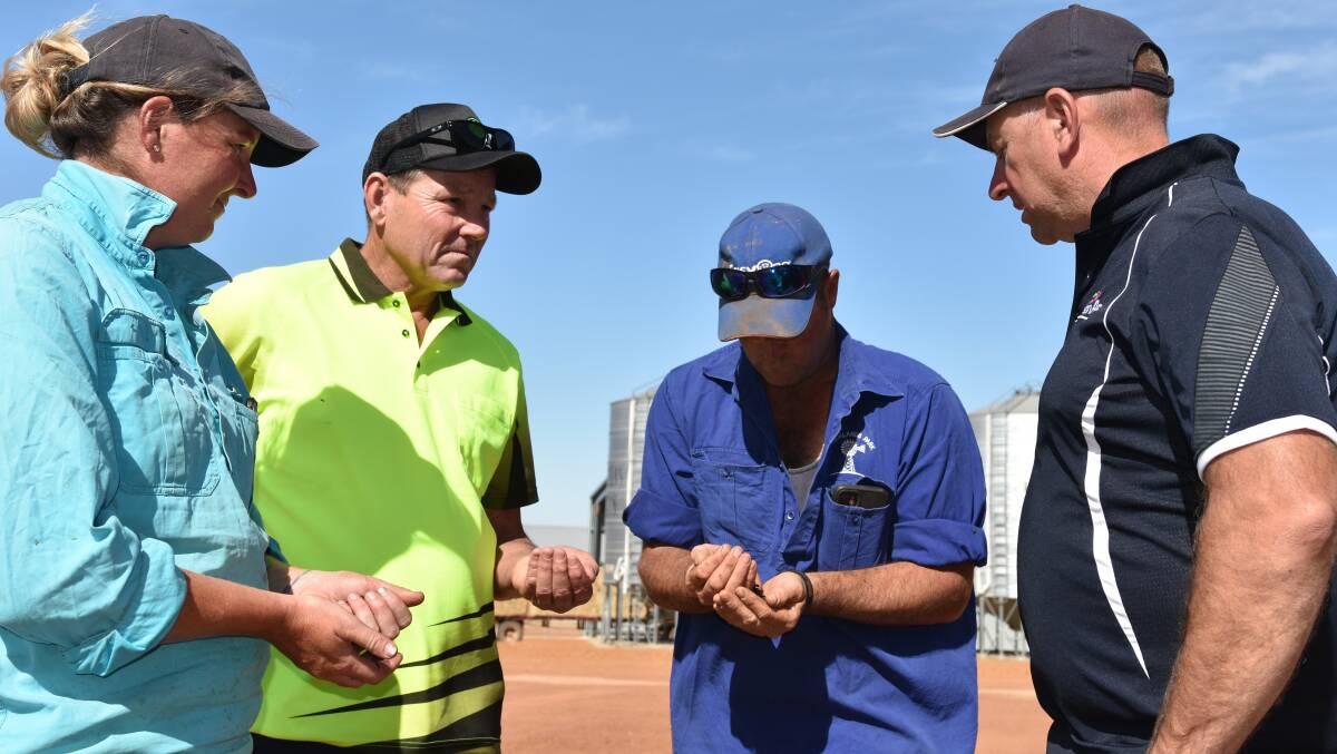 Jeff Edwards (second from right), daughter Chloe and son-in-law Ben Stockton chat with Carbon Ag's Brad Wisewould about the company's WA Broadacre Blend compost and new carbon granule product for seeding applications at the family's Brooklands property, east of Brookton.