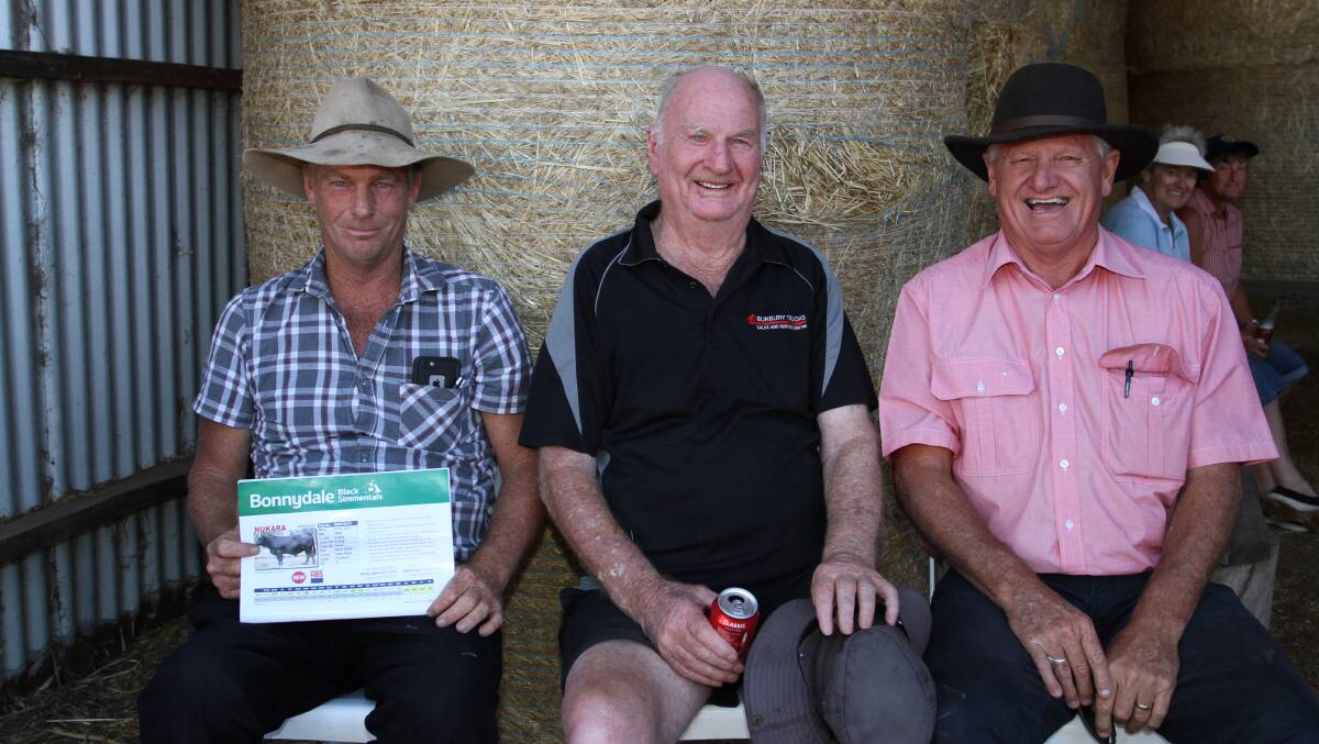 Regular volume buyers at the Bonnydale sale Rodney (left) and Brian Wilson, Yornup Holdings, Yornup and Deane Allen, Elders Bridgetown, caught up following the sale. Yornup Holdings purchased two SimAngus bulls and one Black Simmental bull at the sale paying to $7000 for their selections.