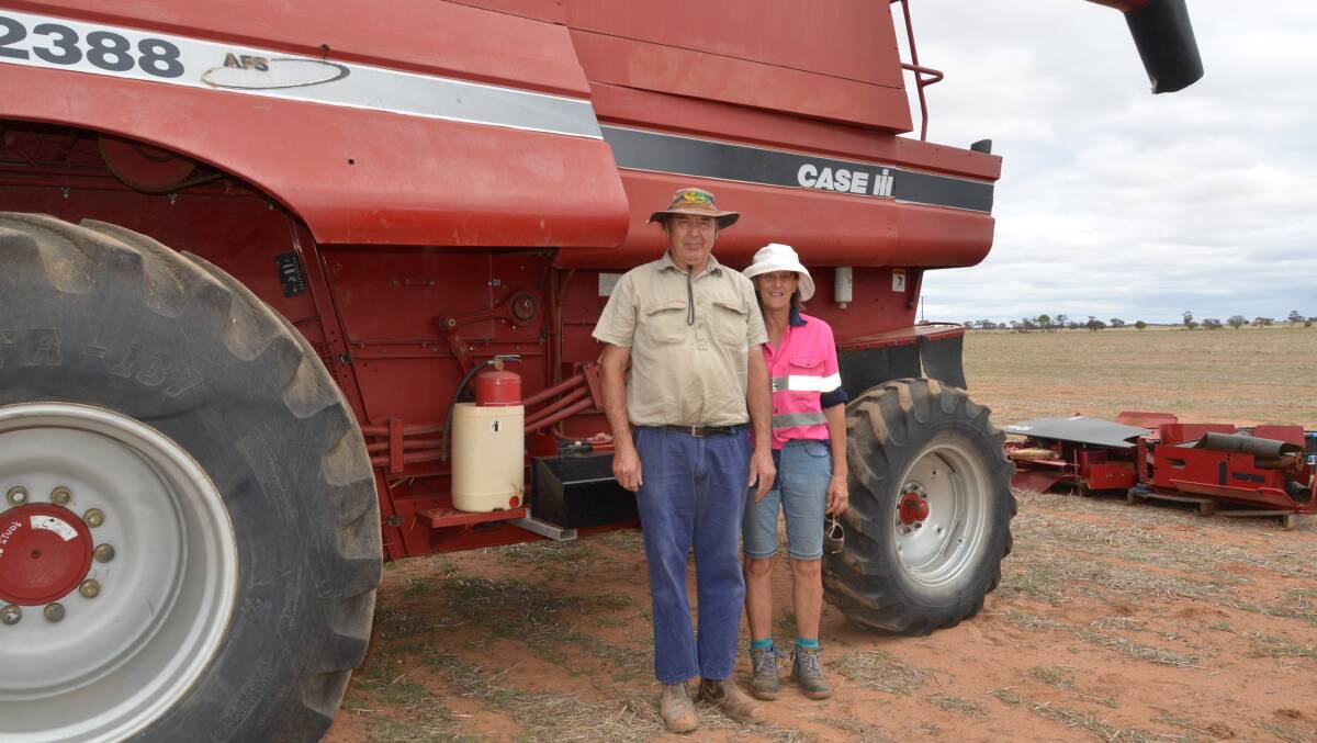 Ian and Julie McKay, Morawa, thoroughly checked out the bigger of two combine harvesters, a Case IH 2388 header with 10.9 metre 1042 draper front on comb trailer. The header showed 4624 engine hours and 3410 rotor hours but failed to attract any interest and was passed in.