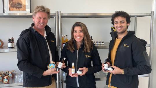 2019 Hackathon participants Figge (left) and Dani Boksjo, with sales and marketing manager Ishaan Bhatia, showing some of the natural skin care products developed using local honey.