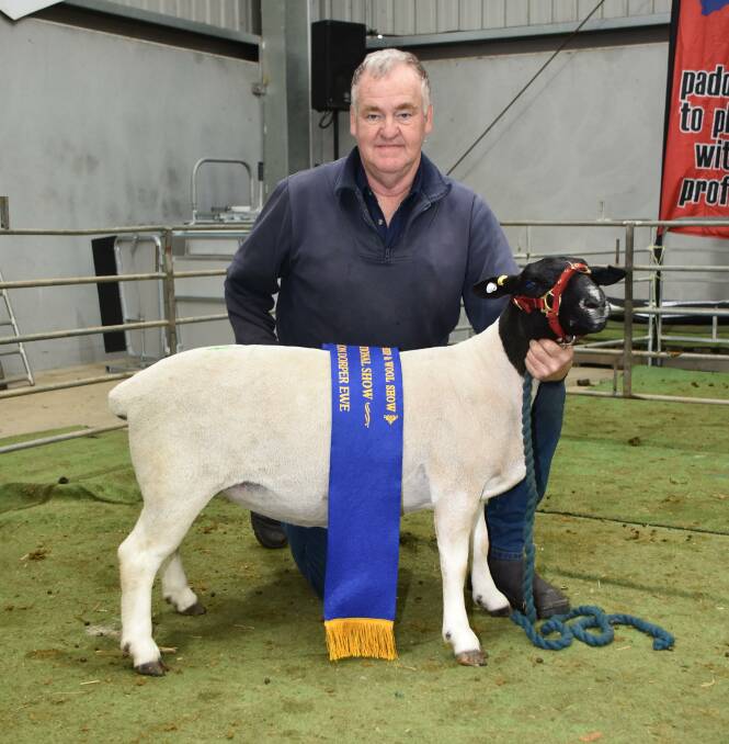 With Kayas junior champion Dorper ewe which sold in the sale for $3400 were Kaya principal Adrian Veitch, Narrogin.
