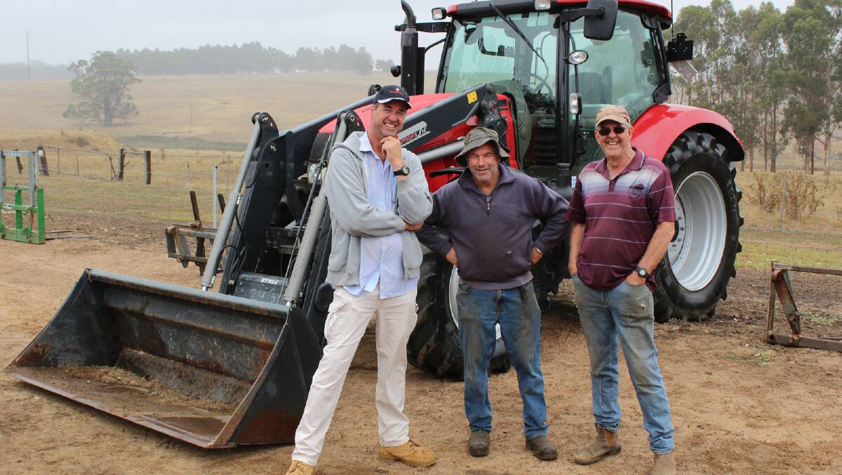 Having a look over the bigger machinery at the Sounness family's clearing sale last week were Woodgenellup famers Rob Williams (left), Ken Hunt and Kim Bennett. The Case Maxxum in the background, with bucket, made $68,000.
