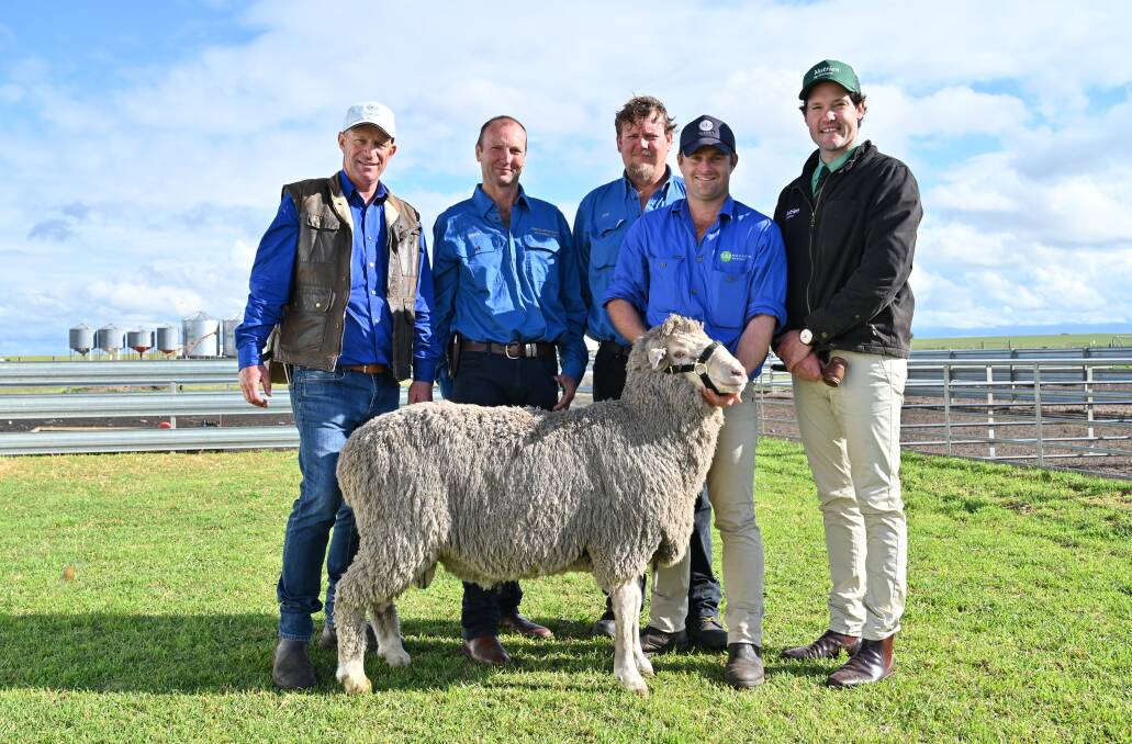Moojepin stud co-principal David Thompson (left), buyers Deane Trotter and Jeff Bergroth, Perillup Estate Pastoral Co, West Mt Barker, Moojepin stud co-principal Hamish Thompson and Nutrien Livestock auctioneer Michael Altus, with the $25,500 second top-priced ram at auction.