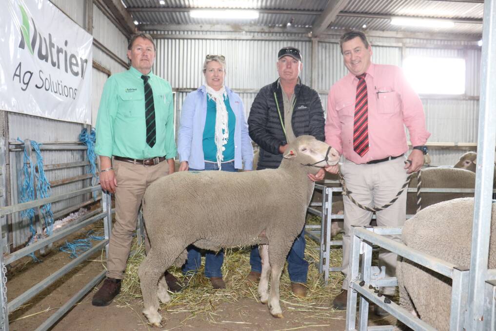 With the top-priced $2900 ram was Nutrien Livestock Breeding representative Roy Addis (left), Tiarri stud co-principal Kelly-Anne Gooch, top price buyer Tom Lynch, Limeric Enterprises, Hyden, and Elders stud stock manager Tim Spicer.