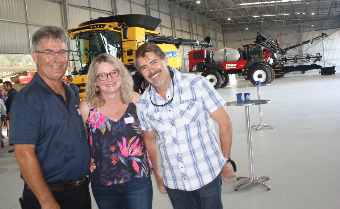 McIntosh & Son, Geraldton, branch manager Craig Ajduk (left) with Wendy and Peter Norris, Moonyoonooka.