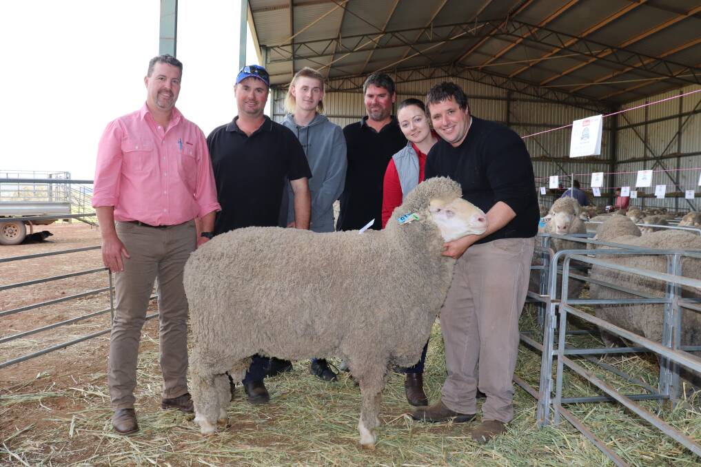  With the $24,000 top-priced Seymour Park ram were Nathan King (left), Elders stud stock, with buyers Nigel, Josh and Damien Morrison, San-Mateo stud, Brookton and Seymour Park stud principals Sarah and Clinton Blight.