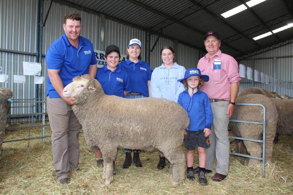 Prices hit the $4000 mark at the Warralea Poll Merino ram sale. With the top-priced ram were Warralea stud principal Jarrod King (left), Fraser, Chelsea, India and Hamish King and Elders, Albany agent Nigel Hawke, who purchased the ram on behalf of an undisclosed buyer.