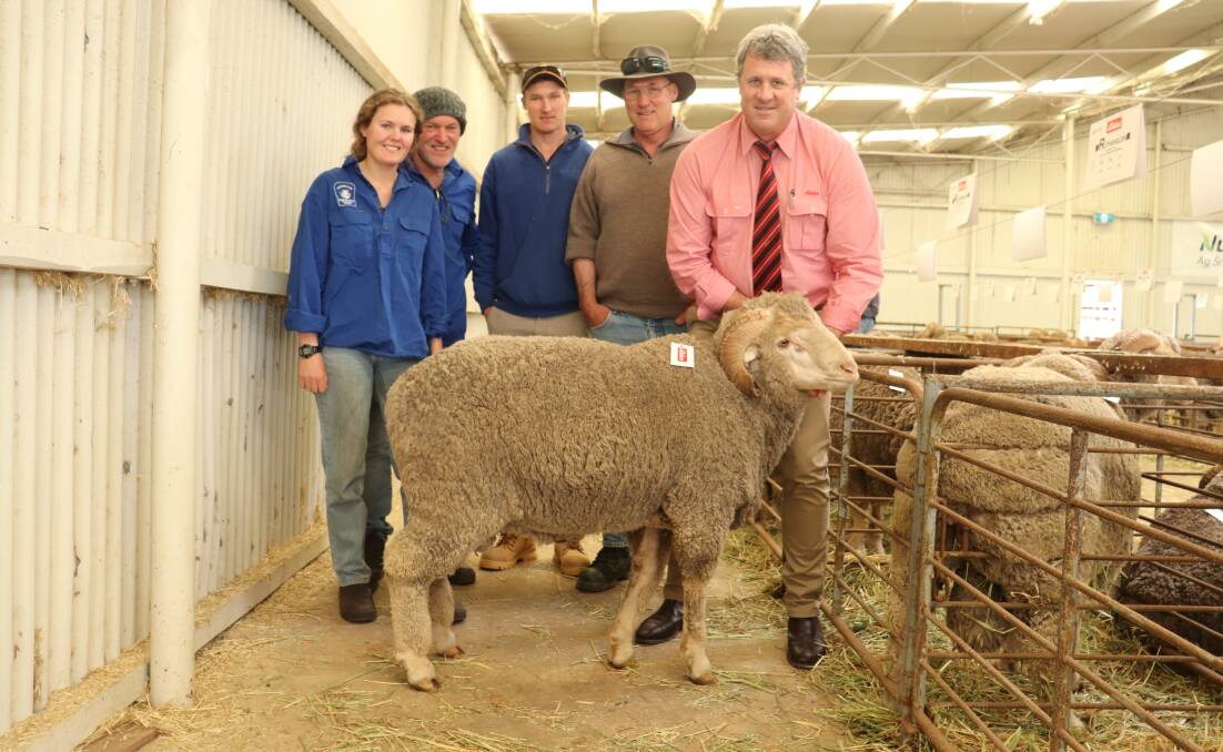 Georgia Dawes, 20, her father and Rutherglen studmaster Whippy Dawes, repeat buyers of the top-priced horned ram at $3100 Ben Doyle and his father Greg, Wylivere Farms, Corrigin, with Paul Keppel, Elders Narrogin, holding the ram.