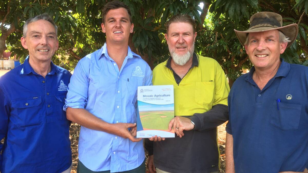 DPIRD research scientist Geoff Moore (left), development officers Samuel Crouch and Christopher Ham and senior research scientist Clinton Revell with the recently launched Mosaic agriculture  A guide to irrigated crop and forage production in northern WA.