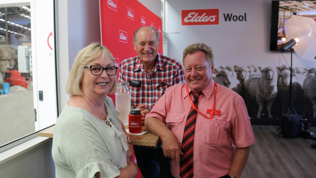  Former Southern Cross woolgrowers Kerry and Peter Dunbar, North Dandalup and Elders WA wool sales manager north Tim Burgess.