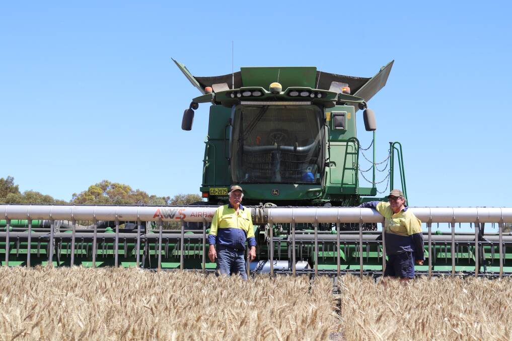 Barry Haywood (left) with his son-in-law Lyndon Bird. Barry and his son's Jason and Simon Haywood joined their farming enterprise in Goomalling with Lyndon and his son Tyson about five years ago to help with the worker shortages they were experiencing at the time.