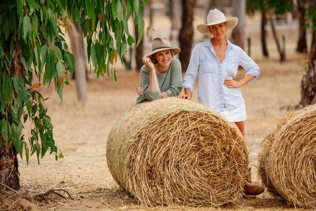 Actor, writer and film-maker Bec Bignell (left) and singer Celeste Clabburn, from Victorian band The Sunny Cowgirls, play best friends George and Paul in the seven-part series Homespun.