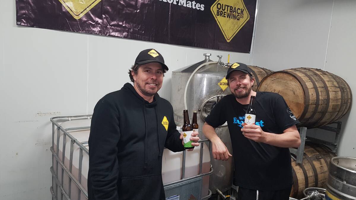 Twins Adam Watts (left) and brother Peter relax with a beer in the microbrewery they built in the Lower Chittering Valley. They have built Adam's home brewing hobby into a growing part-time business, Outback Brewing Co.