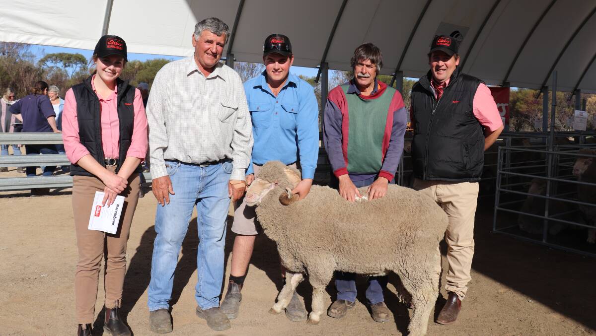  Annual repeat buyer Mervyn Ogilvie (second right), Airlie Park, Narembeen, paid $1400 for the top-priced Crichton Vale Merino ram. With him are Elders trainee Alex Prowse (left), Crichton Vale stud principal Bill Cowan and livestock manager Bryce Lansdell and Mr Ogilvie's son Colin who is Elders Narembeen branch manager.