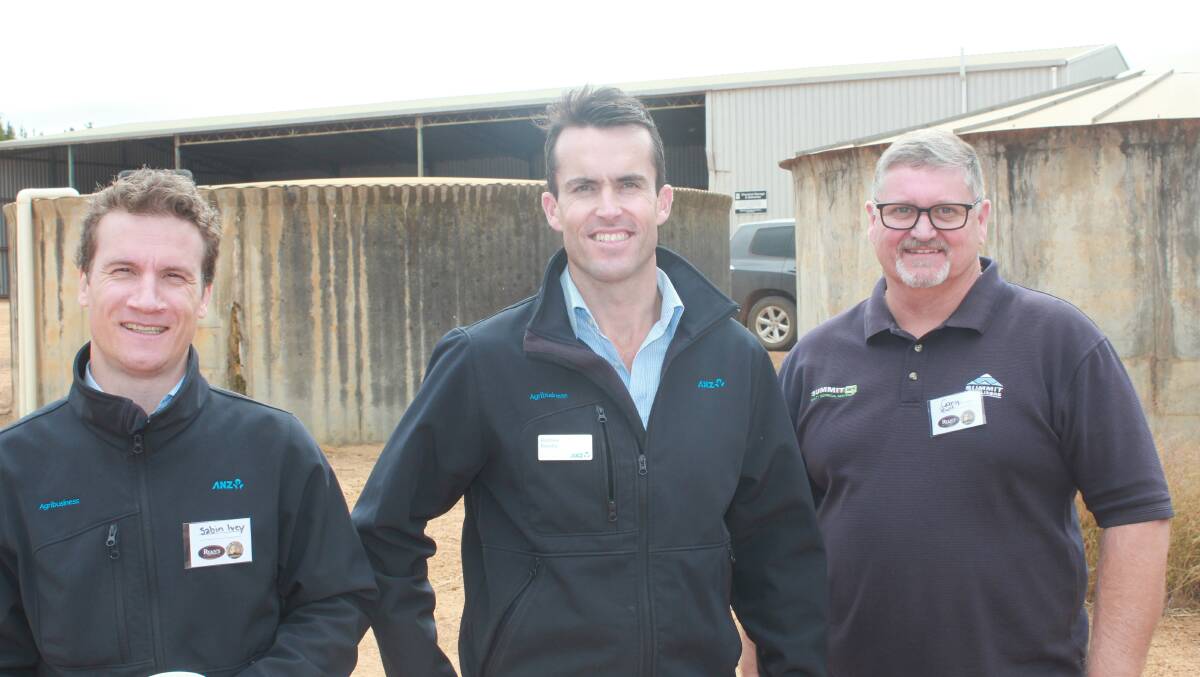 Sabin Ivey (left) and Andrew Roseby, ANZ Bank, were chatting with Gary Lewis, Summit Fertilizers.