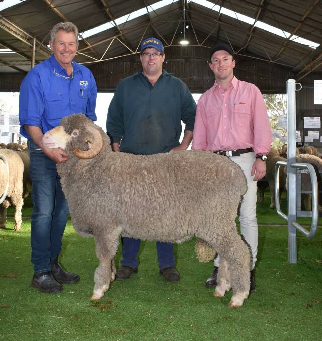 This Barloo Merino sire sold for the sales $8200 second top price. With the ram were Barloo/Willemenup co-principal Richard House (left), buyer Daniel Patterson, Redwood Enterprises Pty Ltd, Gnowangerup and Elders Gnowangerup representative and auctioneer James Culleton.