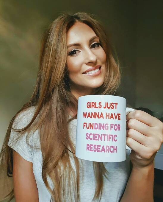 The importance of funding was reflected in the message on this mug given to Kelsey Pool by her husband when she completed her PhD.