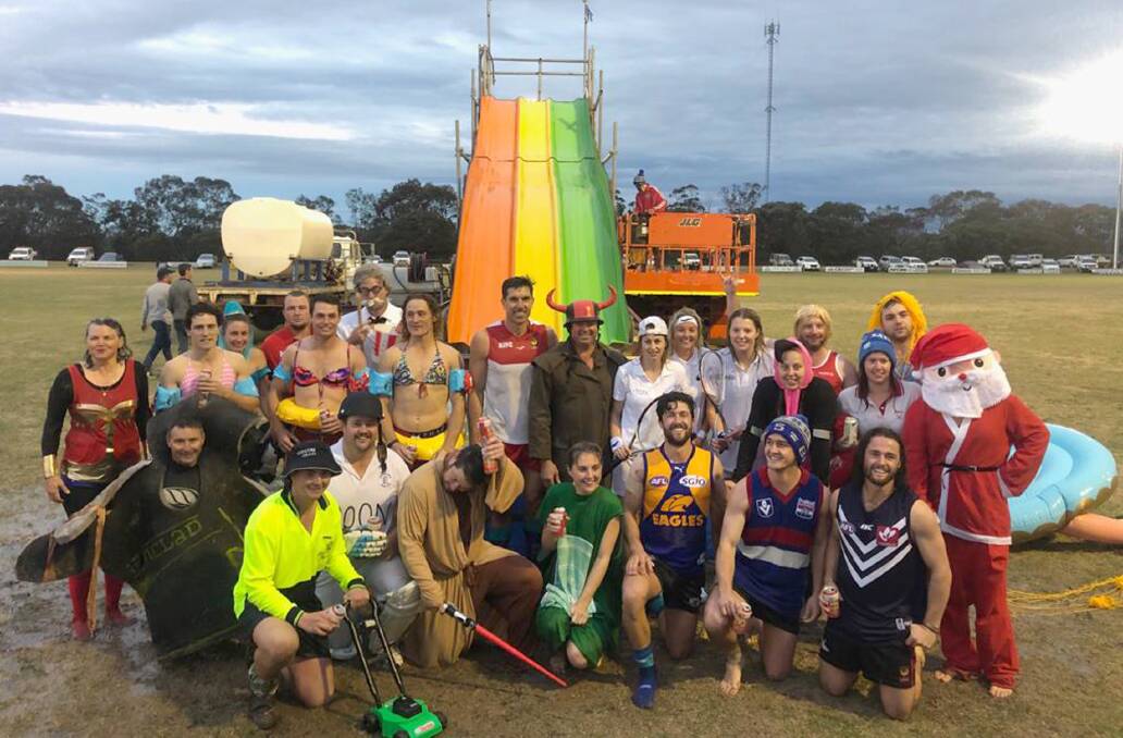 The sliders who took part in the Boxwood Hill and Lake Grace/ Pingrup football clubs' Big Freeze on Friday night. Sliders went down the 12-metre slide in teams of three. The night raised $70,000 for MND research.