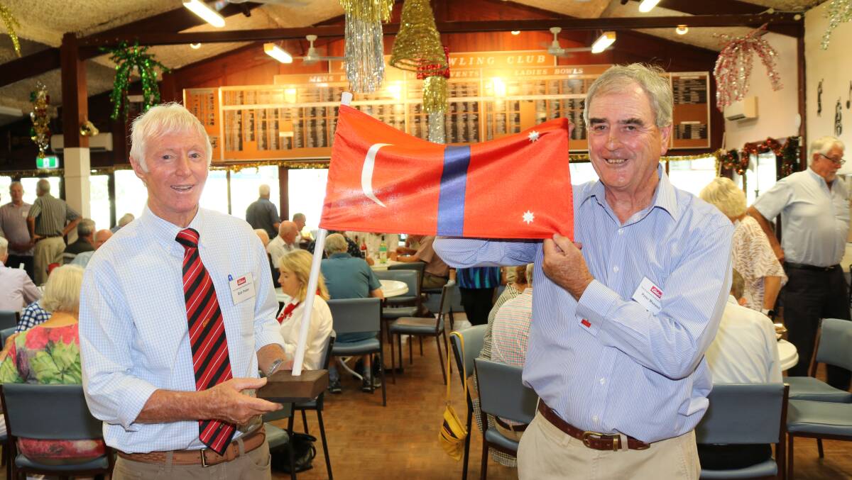 Chairman Bob Peake (left) with the Elders House Flag presented to the EPEA by former Elders WA State manager Peter Maxwell. The flag was flown on ships of the Elder Line which was part owned by the Elder family, founders of Elders and included its flagship vessel the Torrens.