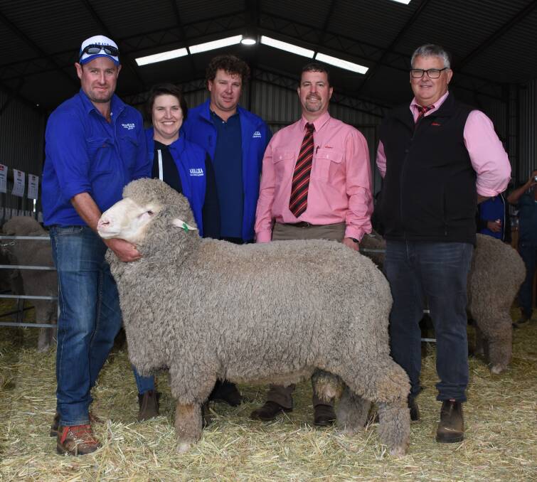 With the $3000 top-priced ram at the Warralea on-property ram sale at Gairdner, which sold to the Goss family, Darkan, were Warralea's Chris Wall (left), stud principals Chelsea and Jarrod King, Elders auctioneer Nathan King and Elders Darkan agent Wayne Peake, who purchased the ram for the Goss family.