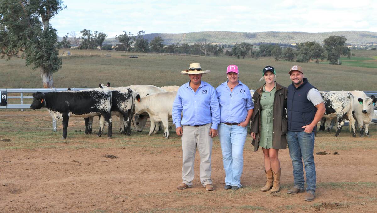With the $7000 all-breeds Australian record price for pregnant commercial heifers were Justin (left) and Amy Dickens, JAD Speckle Park, with buyers Kieran and Bree Quinn, Quinn Cattle Co, Bundaberg, Queensland.