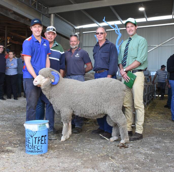 With the $4000 top-priced Merino ram at Kamballie on-property ram sale at Tammin were Kamballie's Curtis (left) and Shayne Mackin, buyers Brett and John Jefferys, Walgoolan and Landmark auctioneer Michael Altus. The sale proceeds from the ram along with another $4770 collected in donations are being donated to the Blue Tree Project and assisting mental health charities in regional areas.