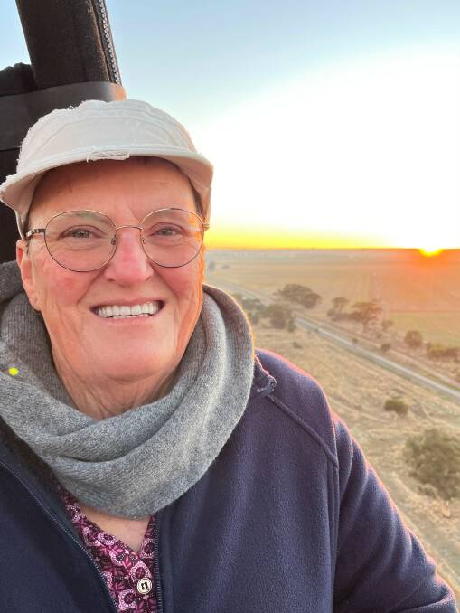 Naomi Gill pictured as the sun comes over the horizon. It is no colder up in the air than it is on the ground and there is no sensation of speed in a balloon because it travels at the speed of the wind.