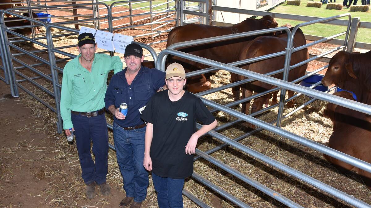 Nutrien Livestock Pilbara agent Daniel Wood (left), with one of the sale's major buyers Brent Smoothy and his son Lance, BR Smoothy & RM Burn, Newman. In the sale Mr Smoothy purchased 21 bulls (18 stud, three commercial) to a high of $19,000 and an average of $7857.