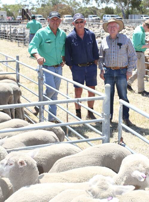 Sale auctioneer Craig Walker (left), Nutrien Livestock Northern and Eastern Wheatbelt, vendor Brian Wake, Hamlin Pool Pastoral Company, Walkaway and Alan Heitman, Arena Farms, Mingenew and Walkaway, caught up following the sale. The Wake family sold a line of 181 May/June-drop September shorn White Suffolk cross lambs which sold for $122 at the sale.