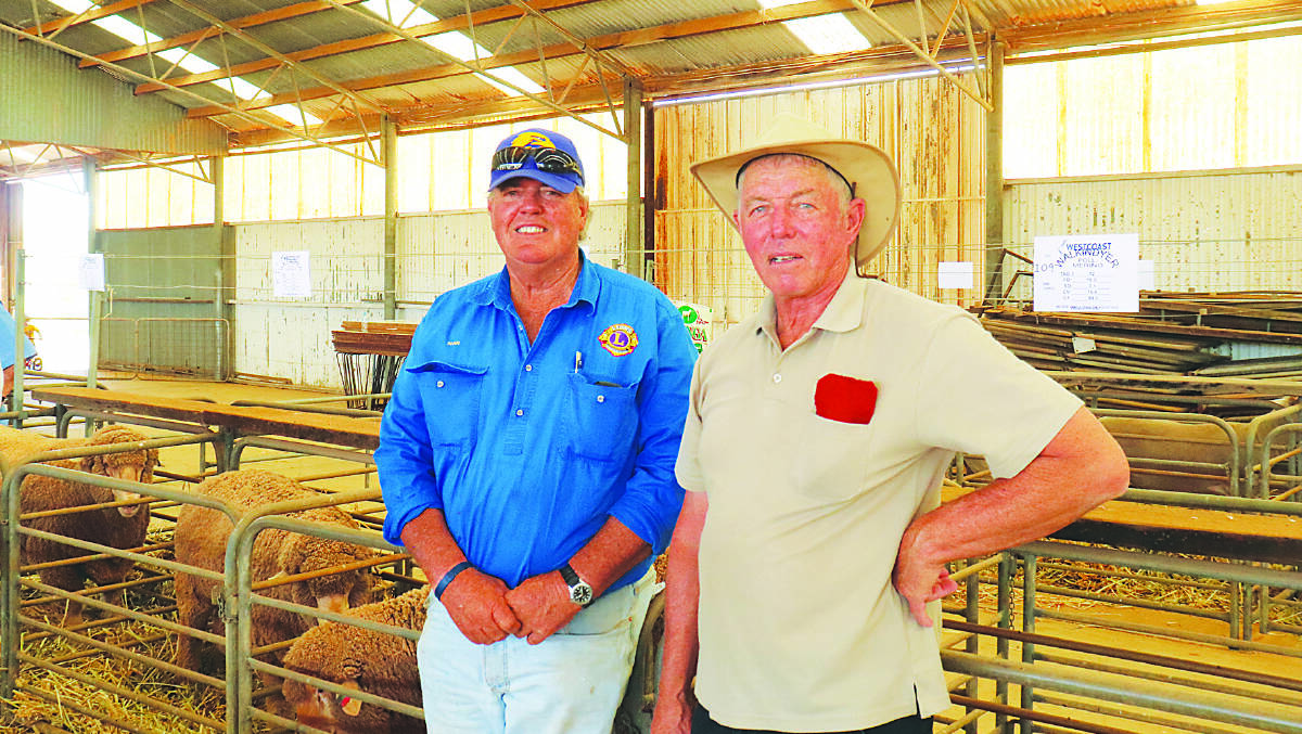 Ivan Teakle (left), Northampton and Rob Suckling, Geraldton, caught up to discuss the rams on offer.