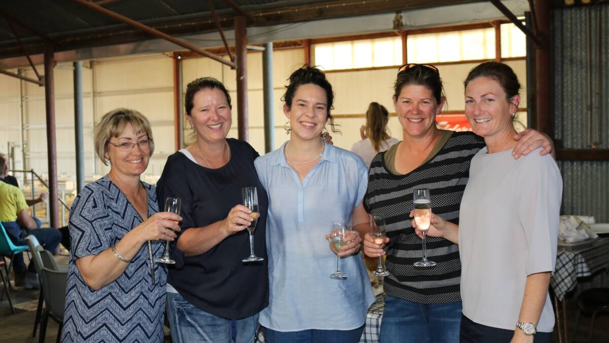 Relaxing post-sale after keeping the crowd well fed and watered throughout the day at East Mundalla were Dot Adams (left), Kukerin, Sharon Robinson, East Mundalla and Tarin Rock trio Sarah Allen, Lisa Pearce and Kristie Stanton.