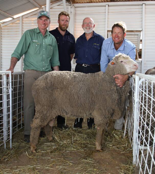 With the $4800 top-priced Poll Merino ram at the 69th annual Cranmore on-property ram sale at Walebing last week were Landmark Moora agent Craig Williamson (left), buyers Matt and Don McKinley, DT & M McKinley, Moora and Cranmore co-principal Kristin Lefroy.