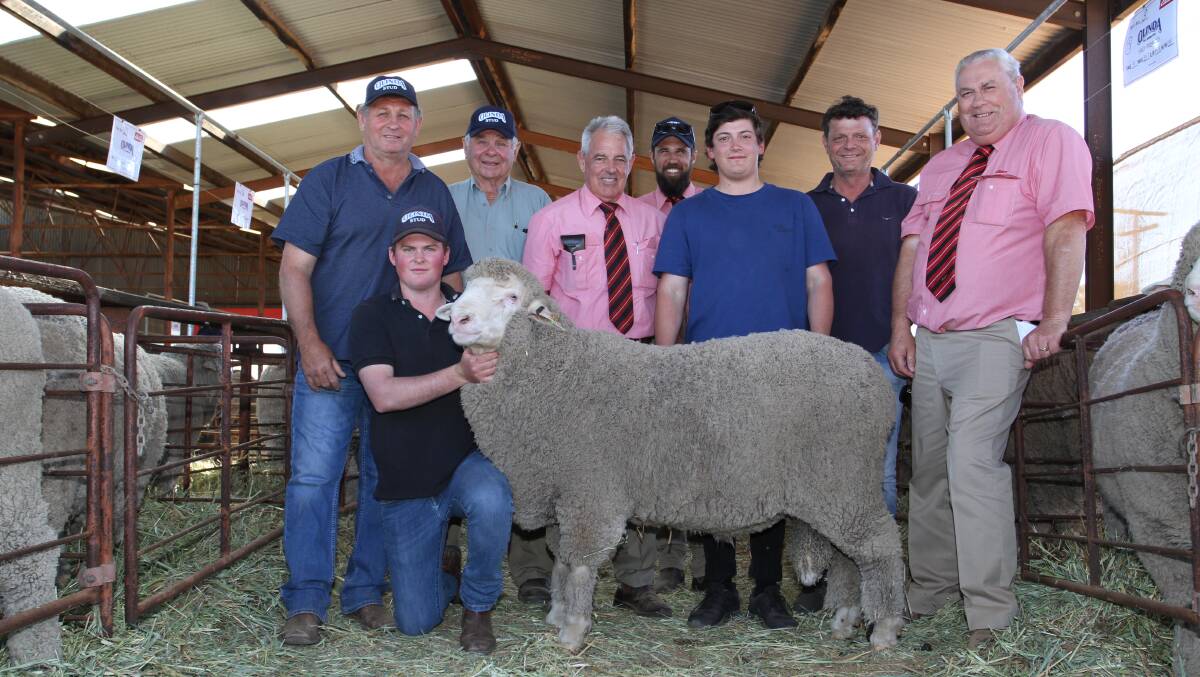 The season's $16,500 third top-priced Merino and Poll Merino ram was this two-tooth Poll Merino sire which sold at the annual Olinda ram sale at Wyalkatchem. With the ram were Olinda stud's Brad (left), Luke and Don Eaton, Wyalkatchem, Elders auctioneer Preston Clarke, Elders Merredin representative Mitchell Clarke, buyers Jacob and James Panizza, Old Aprelia stud, Southern Cross and Olinda and Old Aprelia stud classer Kevin Broad, Elders stud stock.