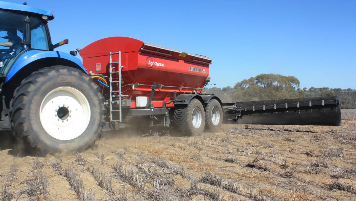 A new Agri-Spread AS2 150T SC showing the trade mark curtains which Agrispread says can spread material in up to 40 kilometres an hour cross winds.