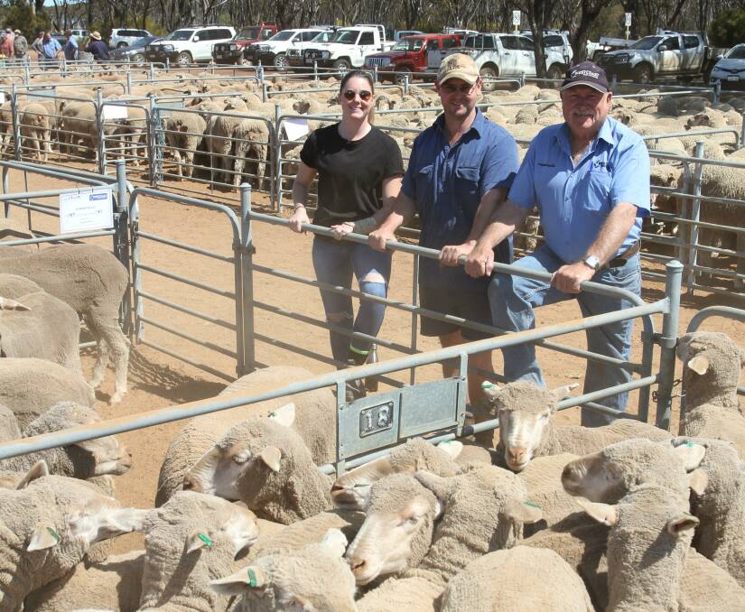  With the $207 second top-priced draft of 1.5yo ewes, 187 August shorn Woolkabin blood ewes offered by PJ Kenny & Co, Karlgarin and purchased by Barry Gangell, Westcoast Wool & Livestock, Kulin, for a Deniliquin, NSW, buyer, were Noemie Repp and Kevin Kenny (second left), PJ Kenny & Co and Phil Barber, Westcoast Wool & Livestock, Corrigin.
