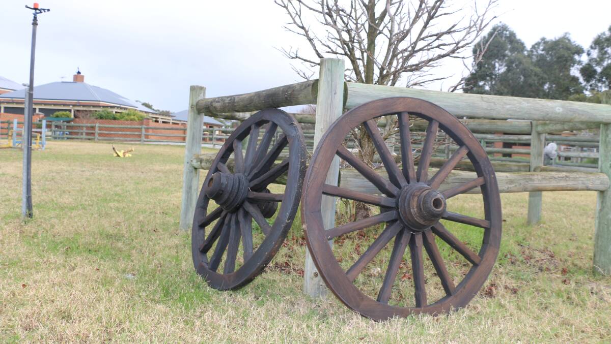 These two wagon wheels were knocked down for $3500 at the Nunn family's clearing sale at Hopeland.