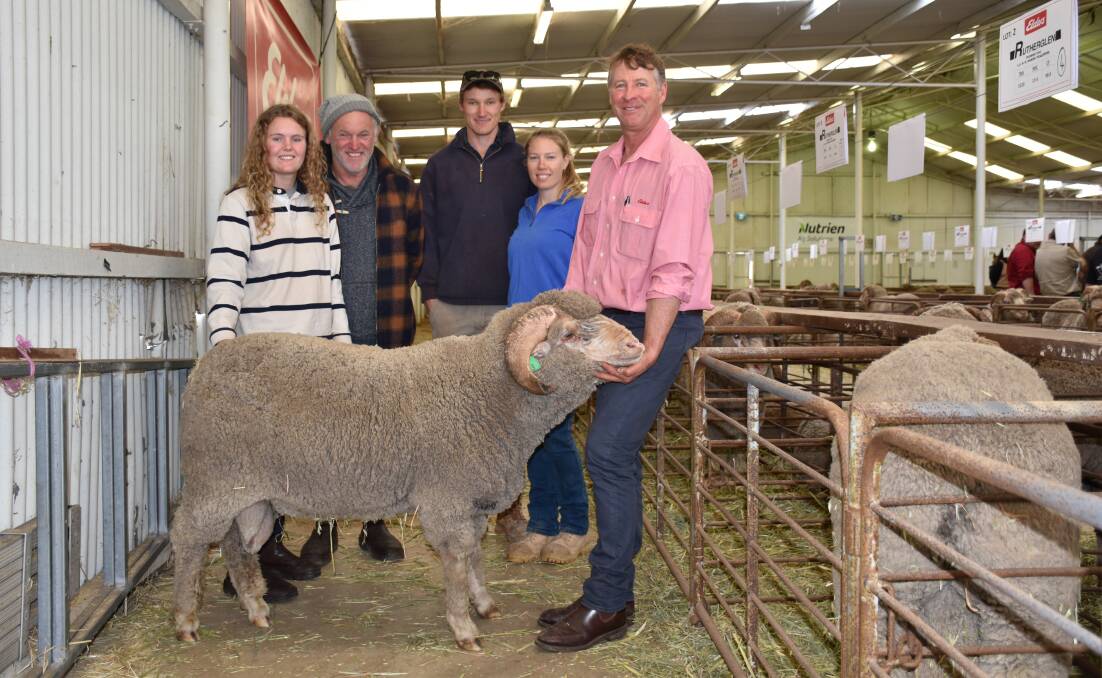 Rutherglen studmaster Whippy Dawes and daughter Georgina (left), are with buyers Ben Doyle, Cindy Ednie-Brown, Wylivere Farms, Corrigin. Holding their $2700 top price ram is Elders Wickepin/Pingelly representative Jeff Browne.