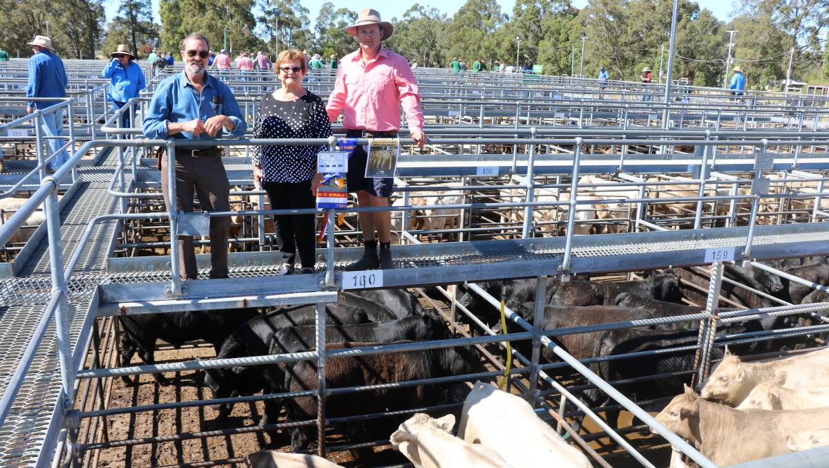 Vendors Trevor (left) and Lesley Houden, Oakview Farm, Crooked Brook and their livestock agent Alex Roberts, Elders Boyanup, with the Houdens champion Charolais pen at the WALSA weaner sale at Boyanup last week.