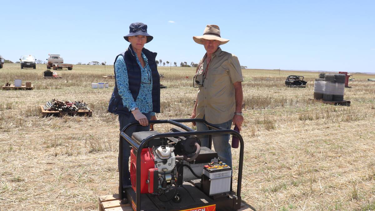 Michele and Liam Dempsey-Doyle, Namban, checking out a 9kVA genset that later sold for $3000.