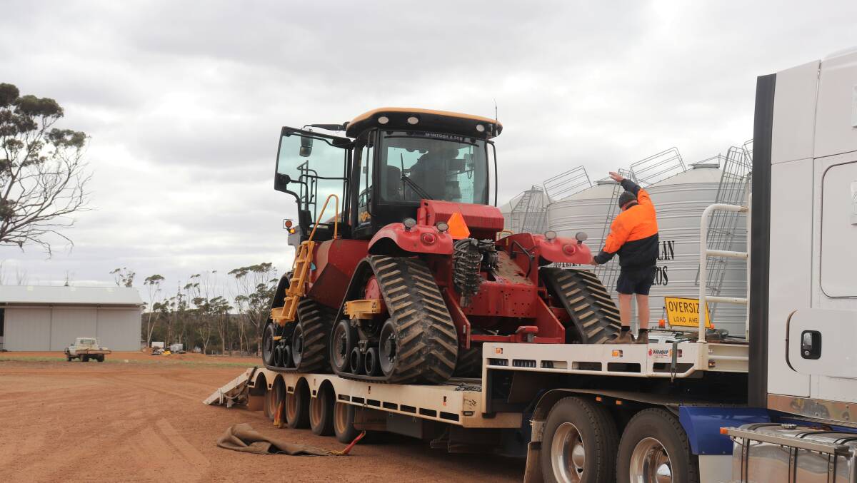 A Versatile 620 Delta Track loaned to the Smith family so they could start their seeding program while they waited for their new tractor to arrive, is loaded on the truck to be returned to McIntosh & Son, Katanning.